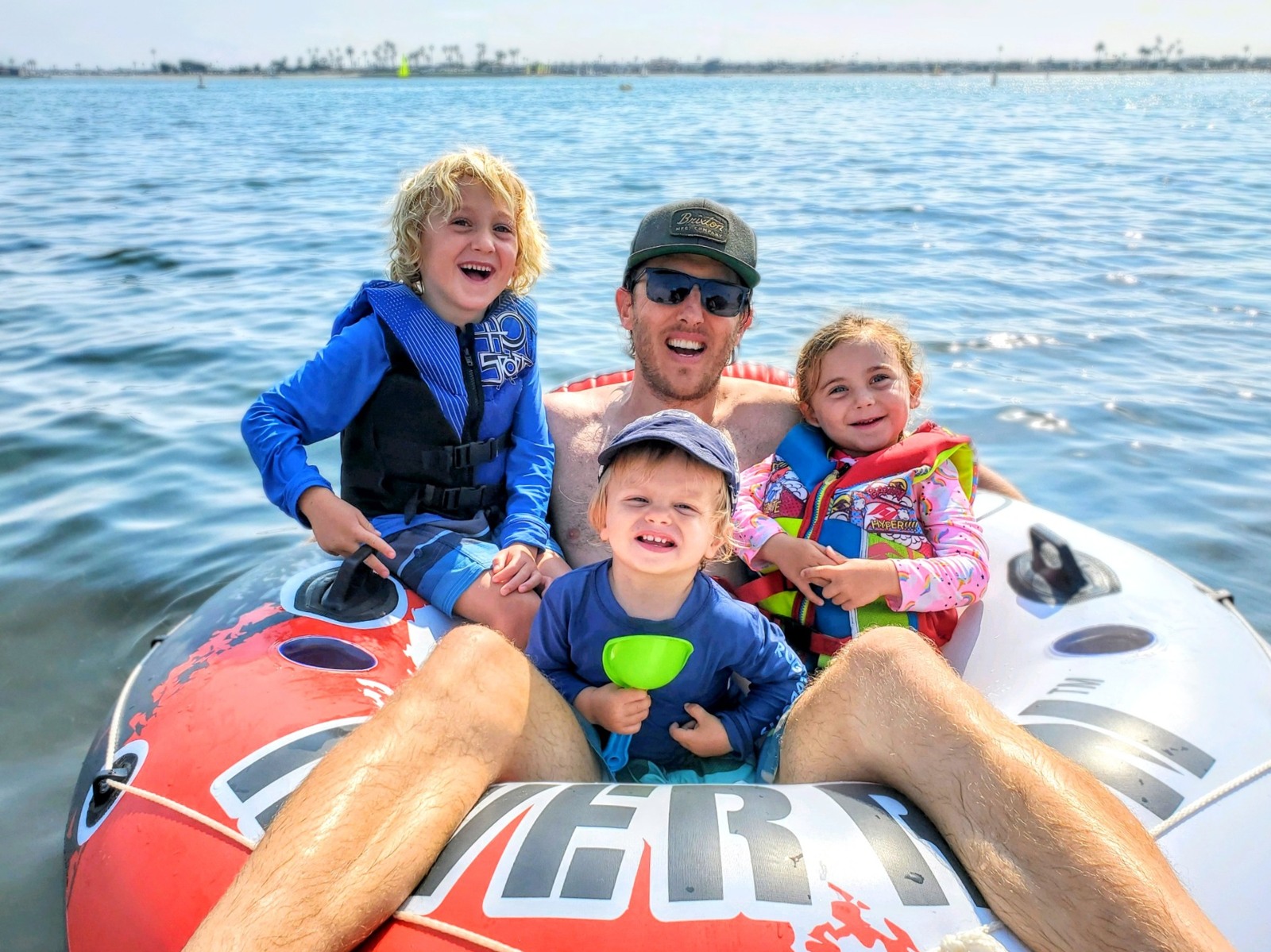 A family enjoying time together on the water